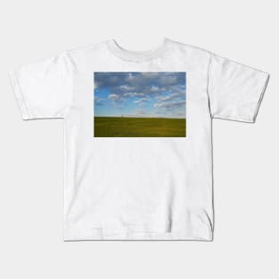 walking a green wheat field Kids T-Shirt